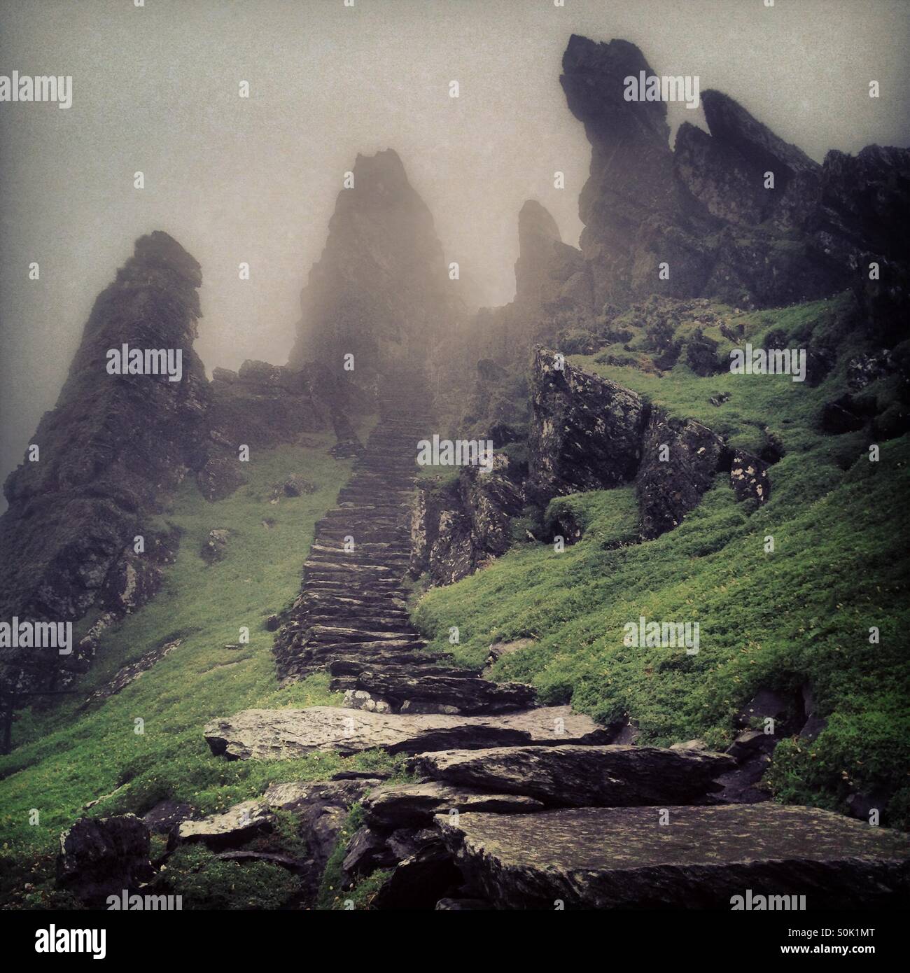 Stairway of Skellig Michael. Skellig Michael is the larger of the two Skellig Islands located 11.6 km west of the Iveragh Peninsula in County Kerry, Ireland. Stock Photo