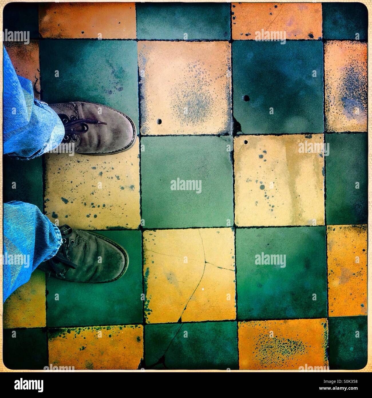 A geometric green and brown floor in a house in Colonia Roma, Mexico City, Mexico - Smartphone Captured Stock Image