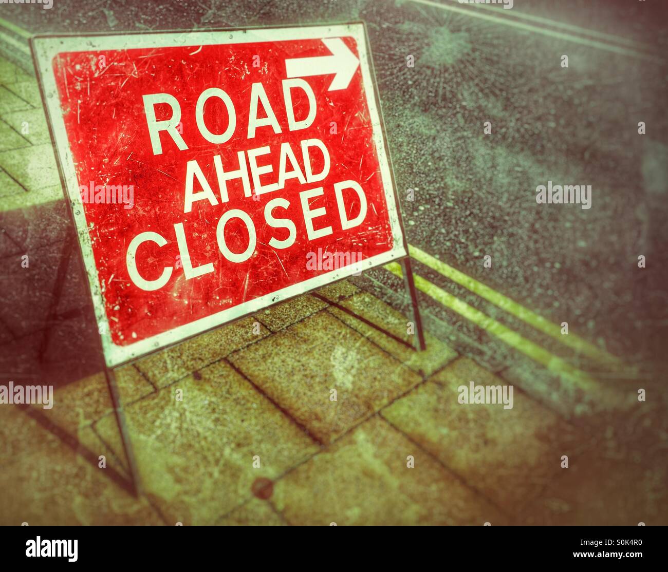 Road ahead closed road sign on a footpath - Smartphone Captured Stock Image