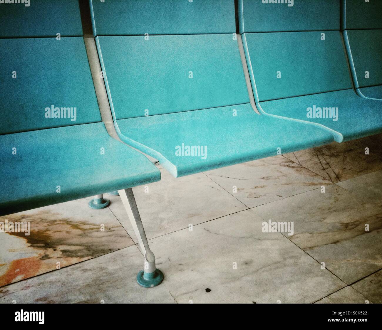 Empty seats at the departure gate in the airport - Smartphone Captured Stock Image