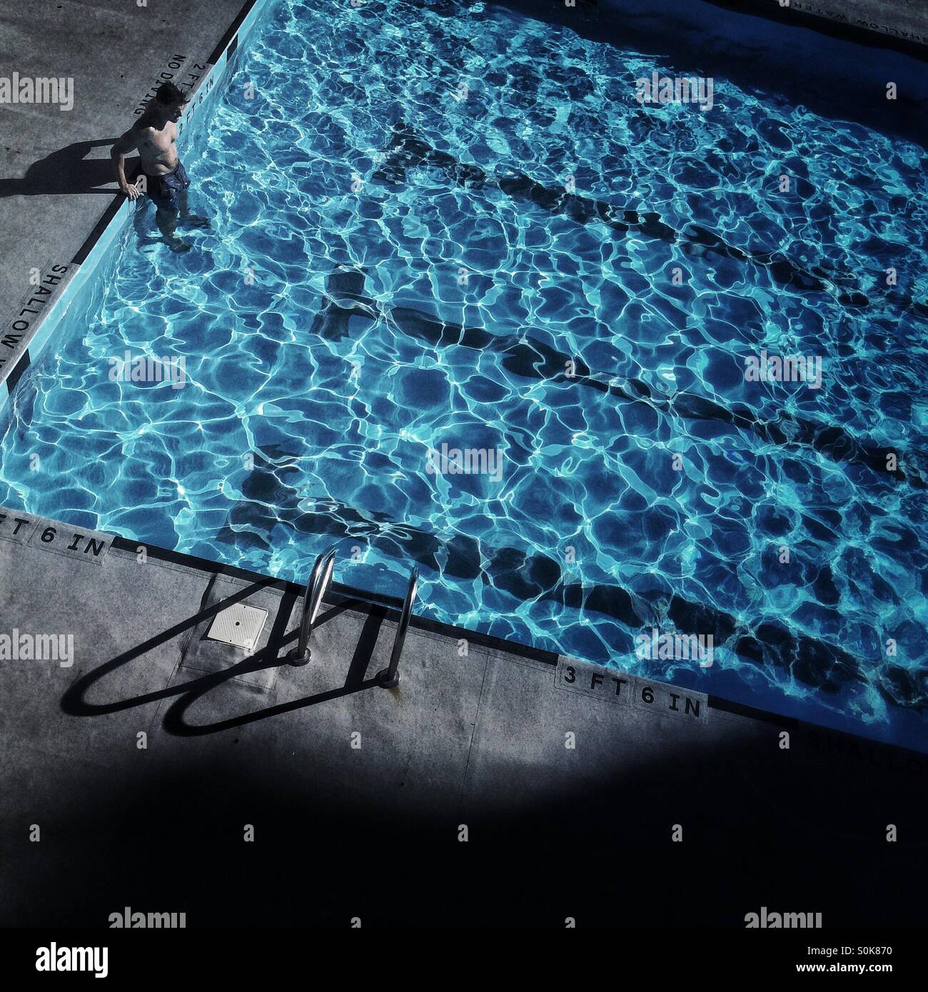 Man by pool - Smartphone Captured Stock Image