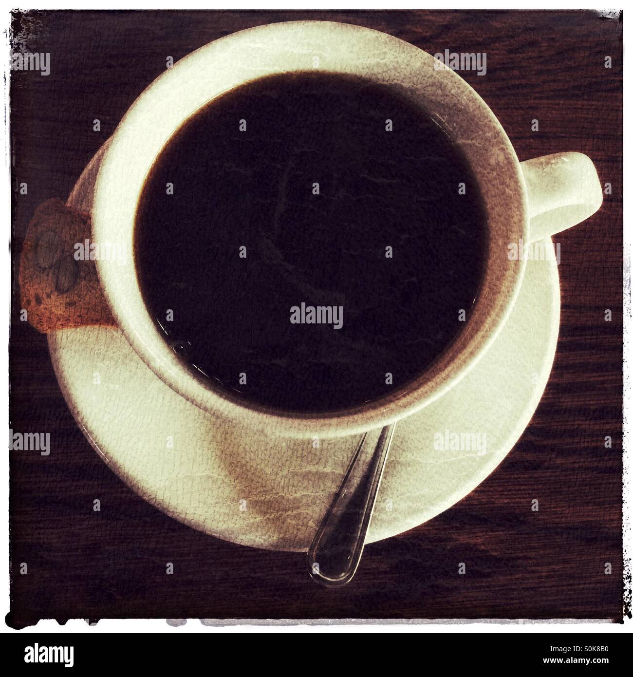 Black coffee and biscotti. - Smartphone Captured Stock Image