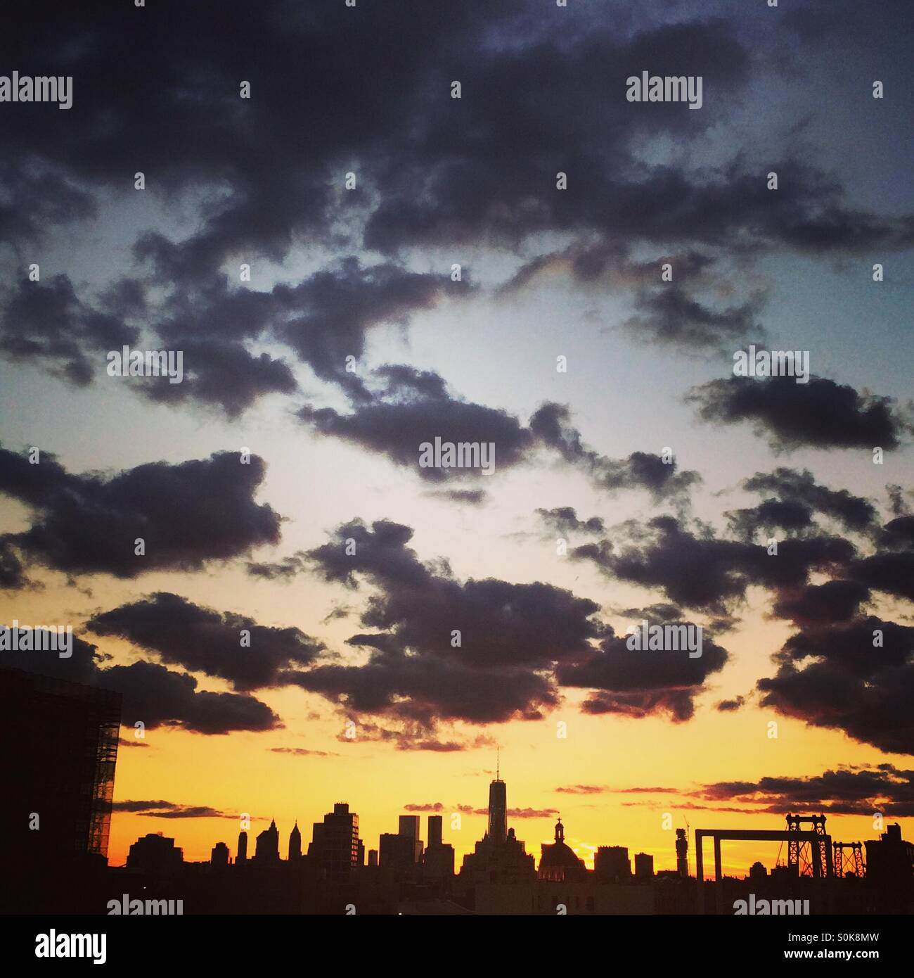The New York City skyline during sunset on September 11, 2015. - Smartphone Captured Stock Image