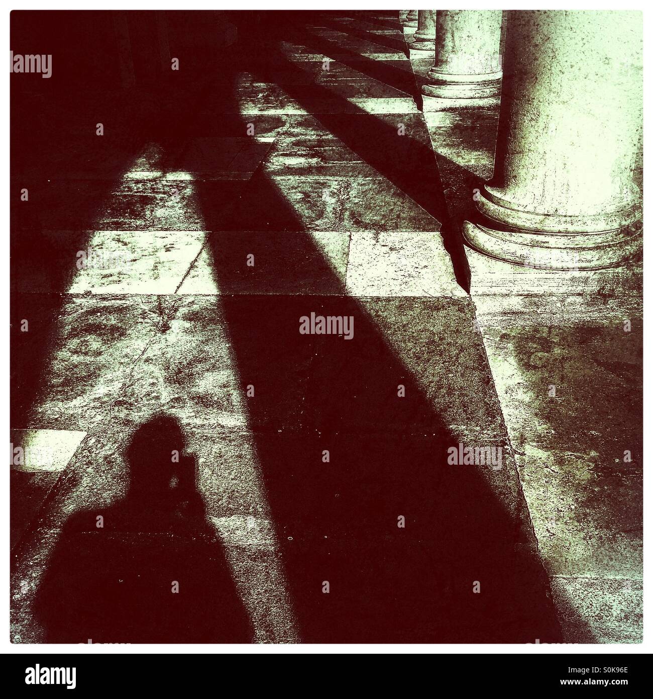 Shadow amongst columns - Smartphone Captured Stock Image