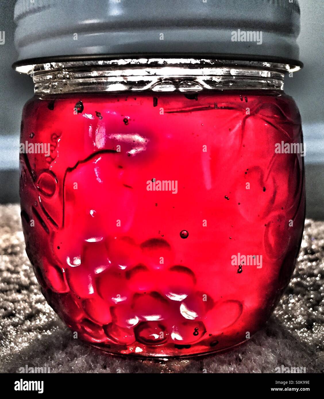 Homemade plum jelly in glass jar Stock Photo