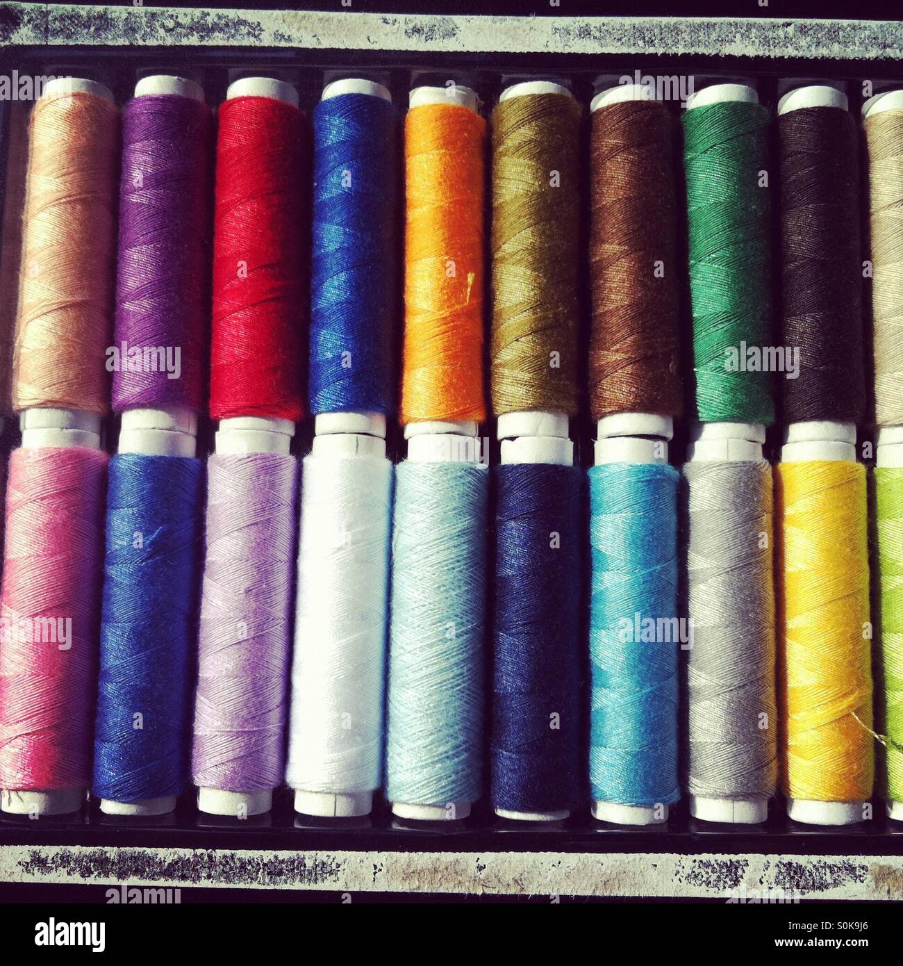 Spools of colorful thread Stock Photo