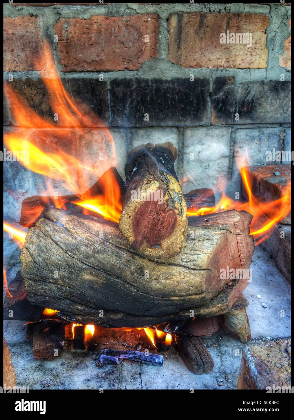 Fire burning in fireplace. - Smartphone Captured Stock Image