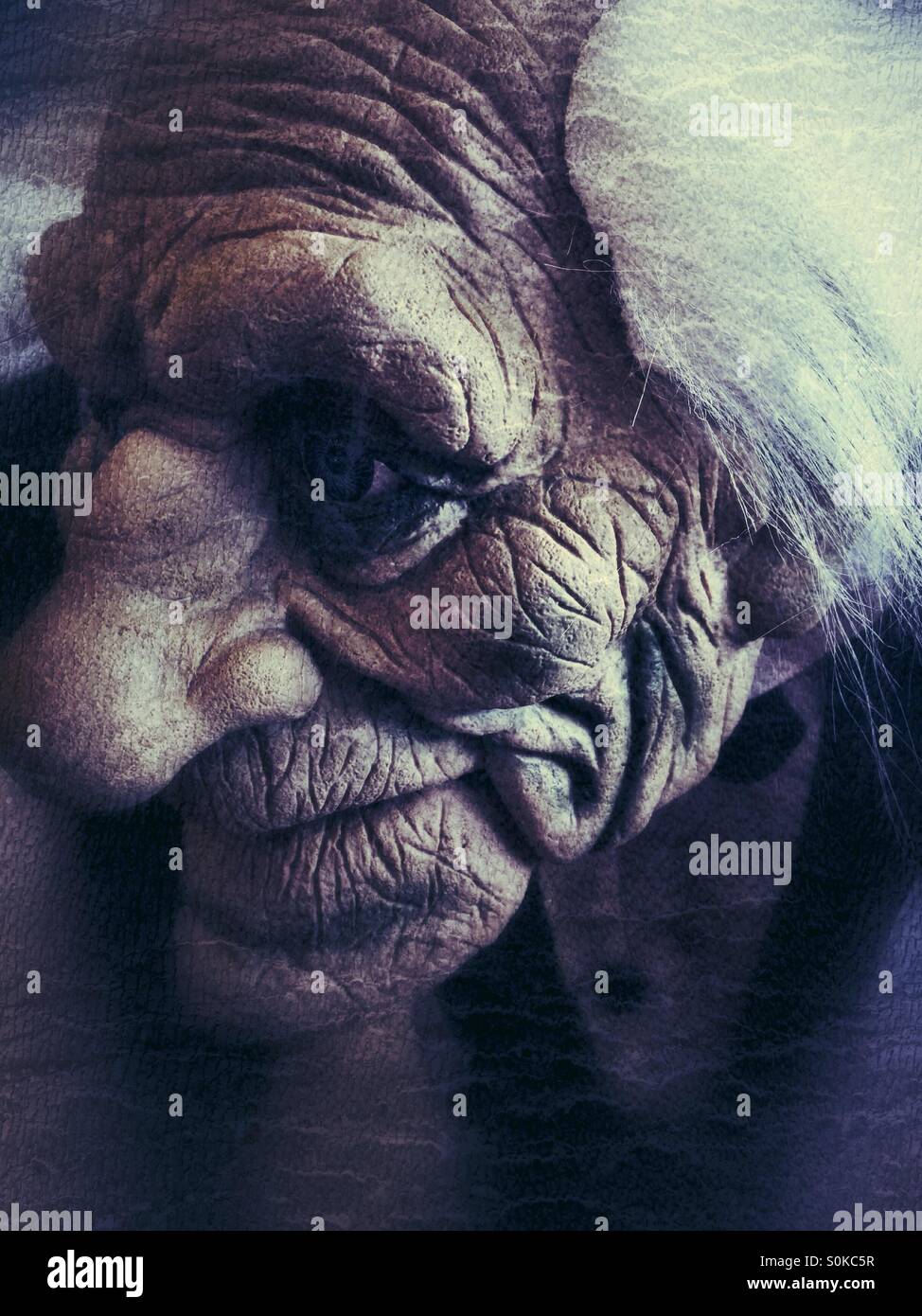 Mask - old man with wrinkled face - Smartphone Captured Stock Image