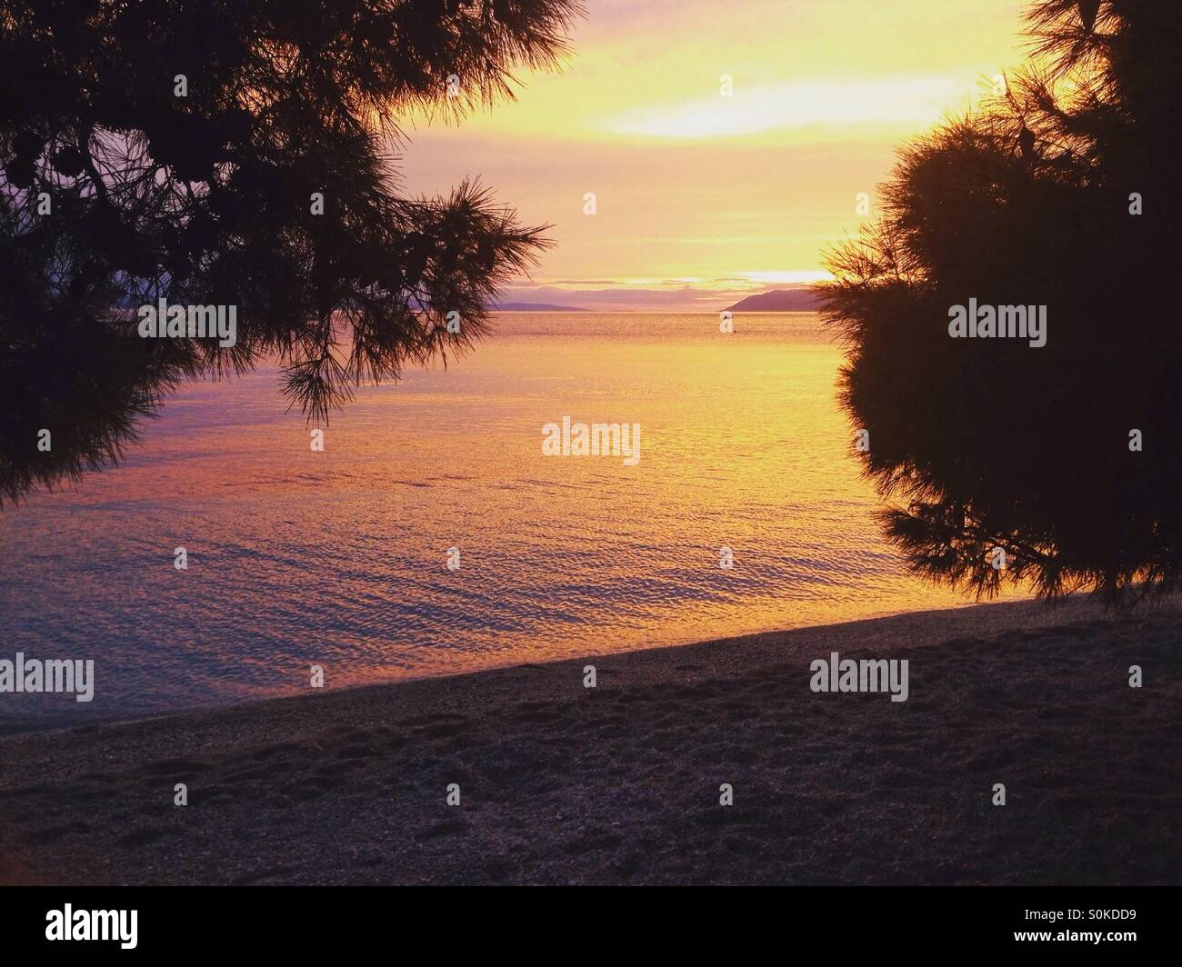 Sunset on beach in Croatia Stock Photo