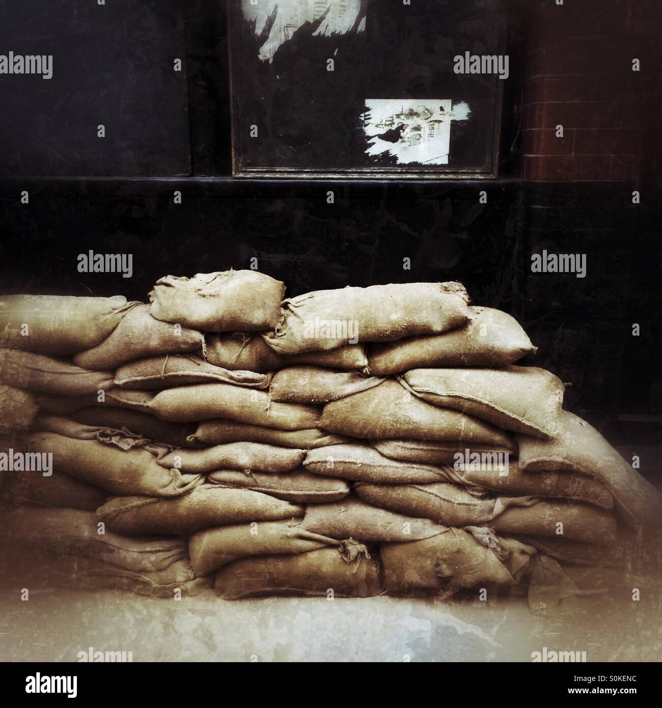 Sand Bags outside a doorway in London - Smartphone Captured Stock Image