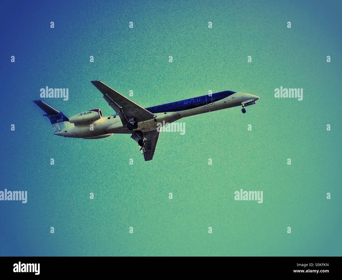 Jet airliner on landing approach Stock Photo