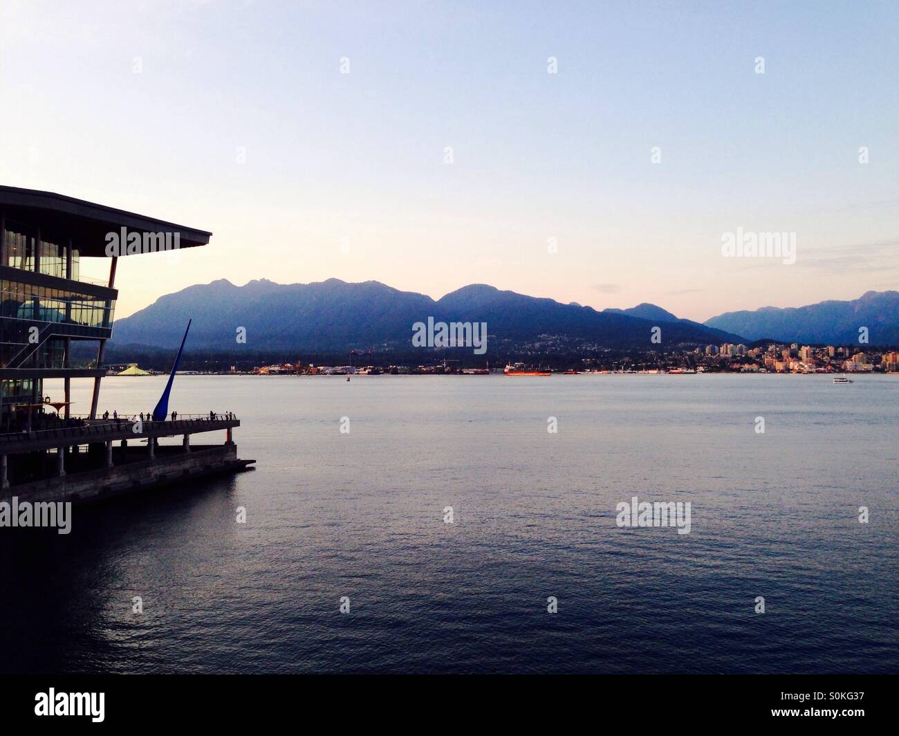 Canada Place Coal Harbour in Vancouver British Columbia Canada with sea and mountains - Smartphone Captured Stock Image