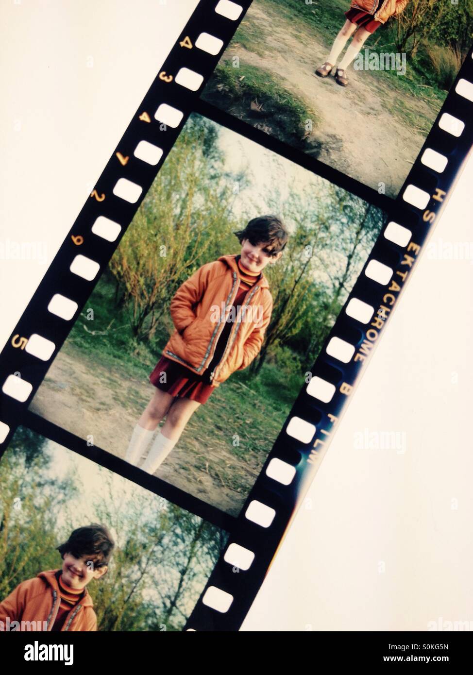Image of child on a negative film strip Stock Photo