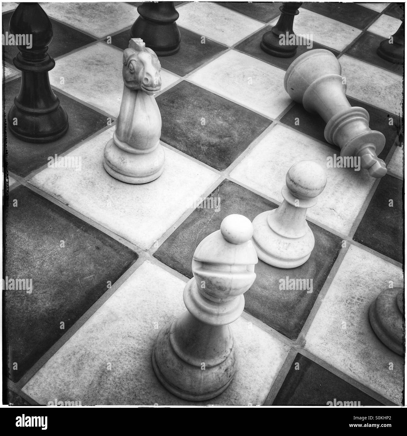 Black and white photograph of giant chessboard . - Smartphone Captured Stock Image