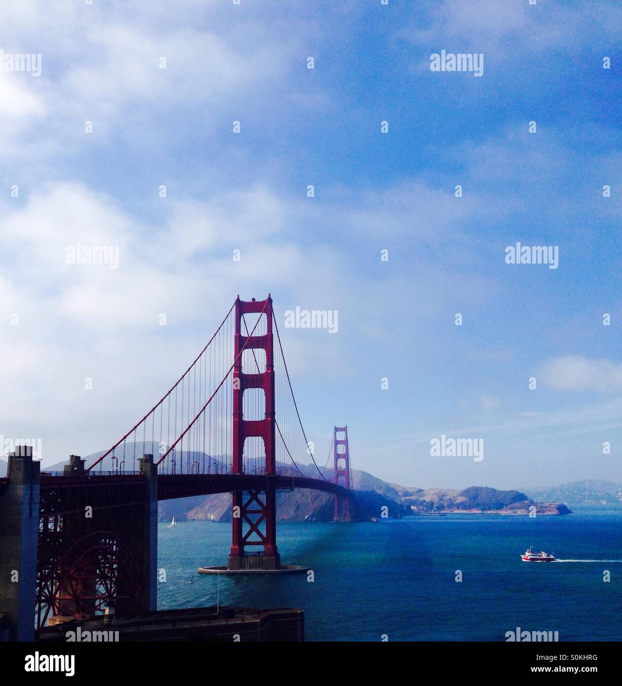 Golden Gate Bridge with a ferry on the bay San Francisco California - Smartphone Captured Stock Image