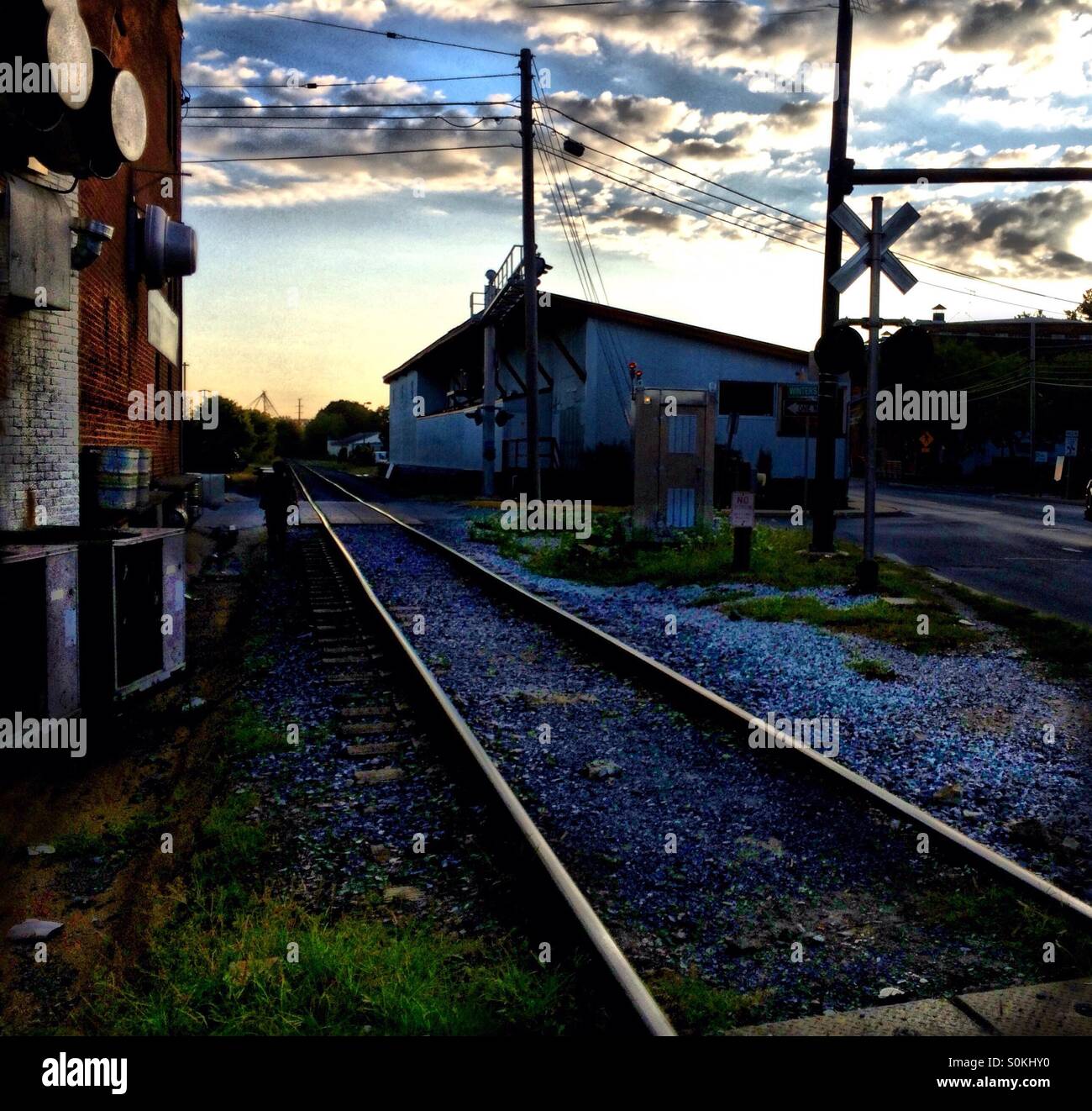 Rail crossing at dawn. Stock Photo