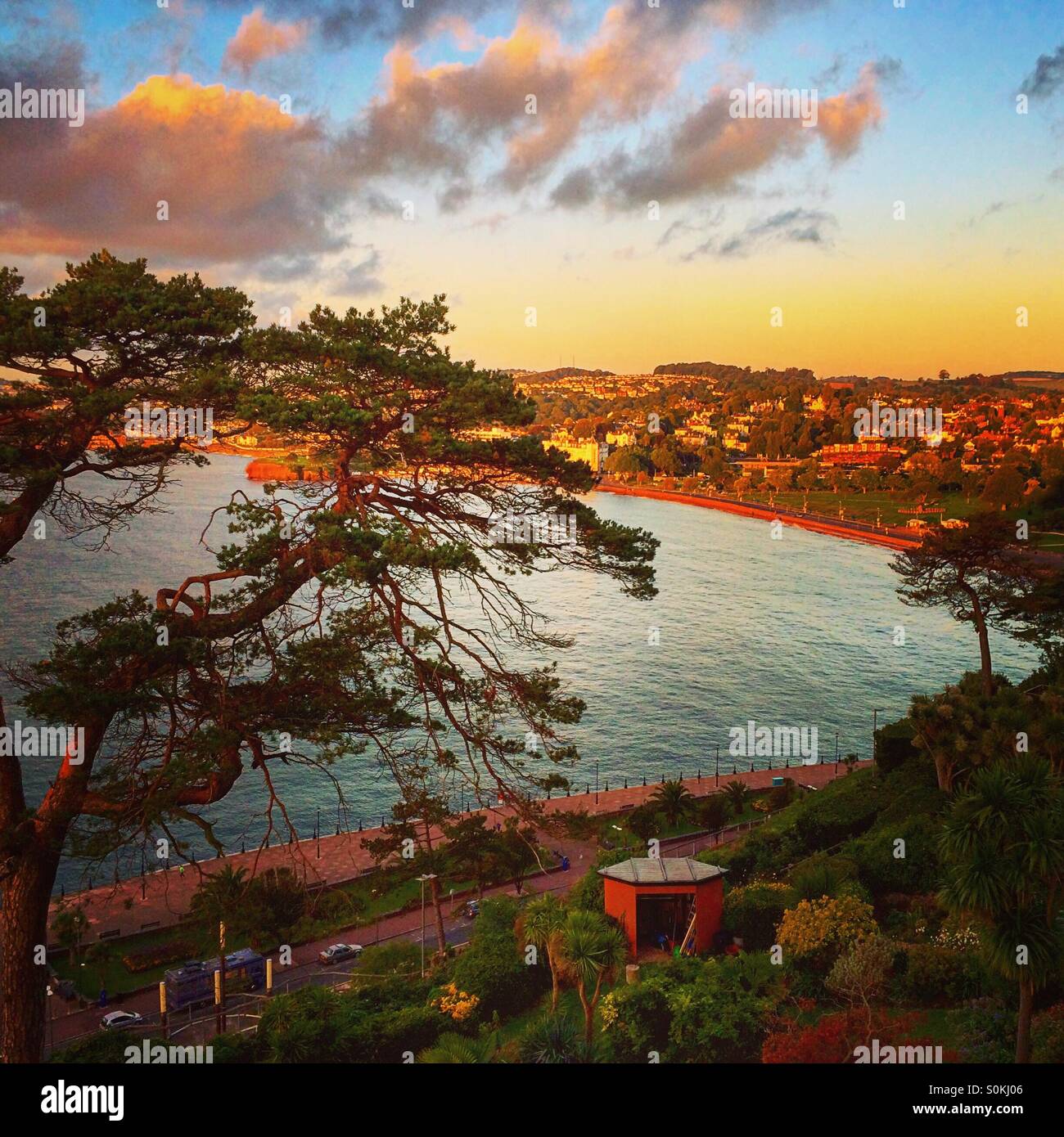 Sunrise over Torquay, Devon, UK, during an Indian summer. - Smartphone Captured Stock Image