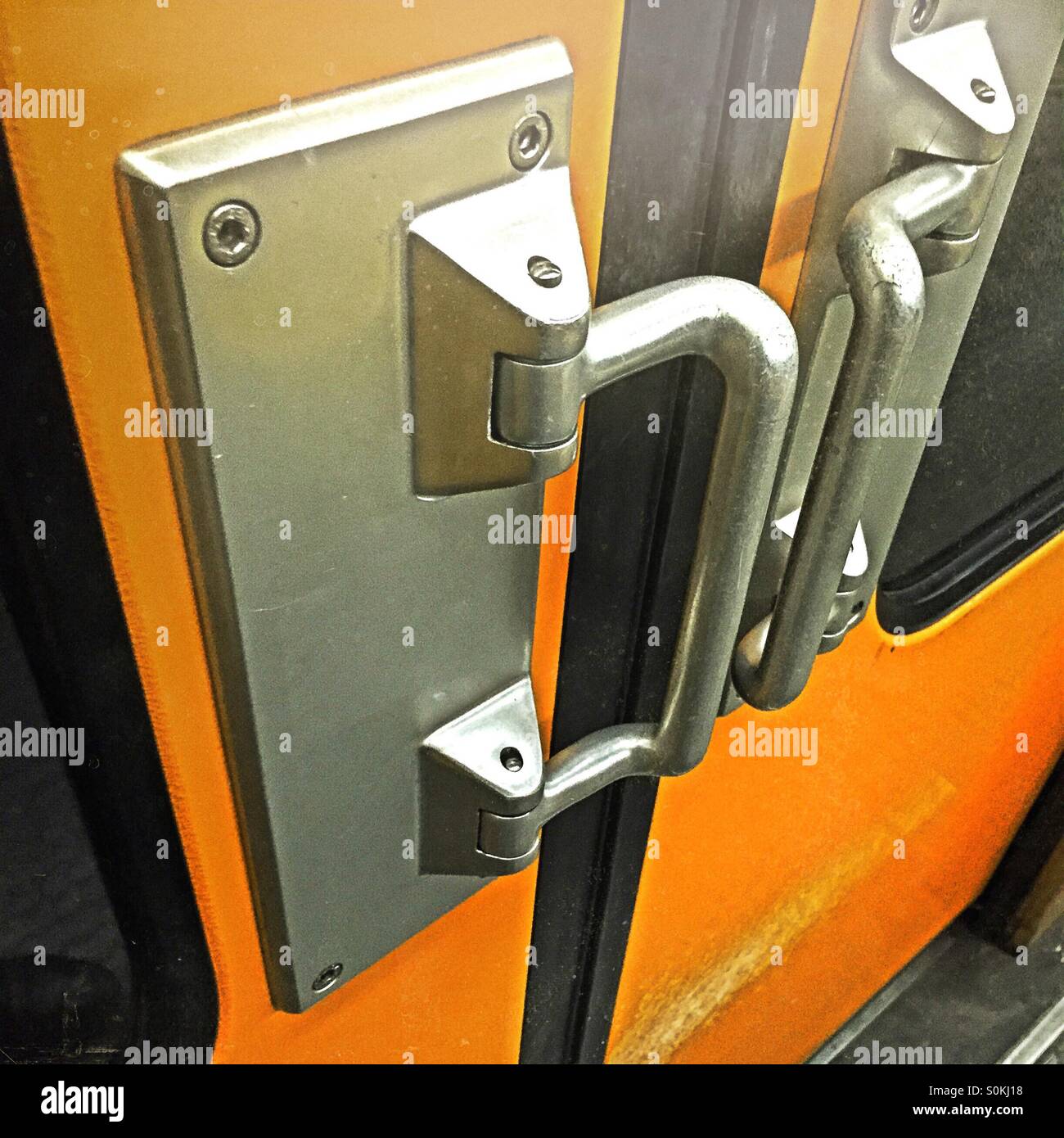 Double door handle of subway car - Smartphone Captured Stock Image