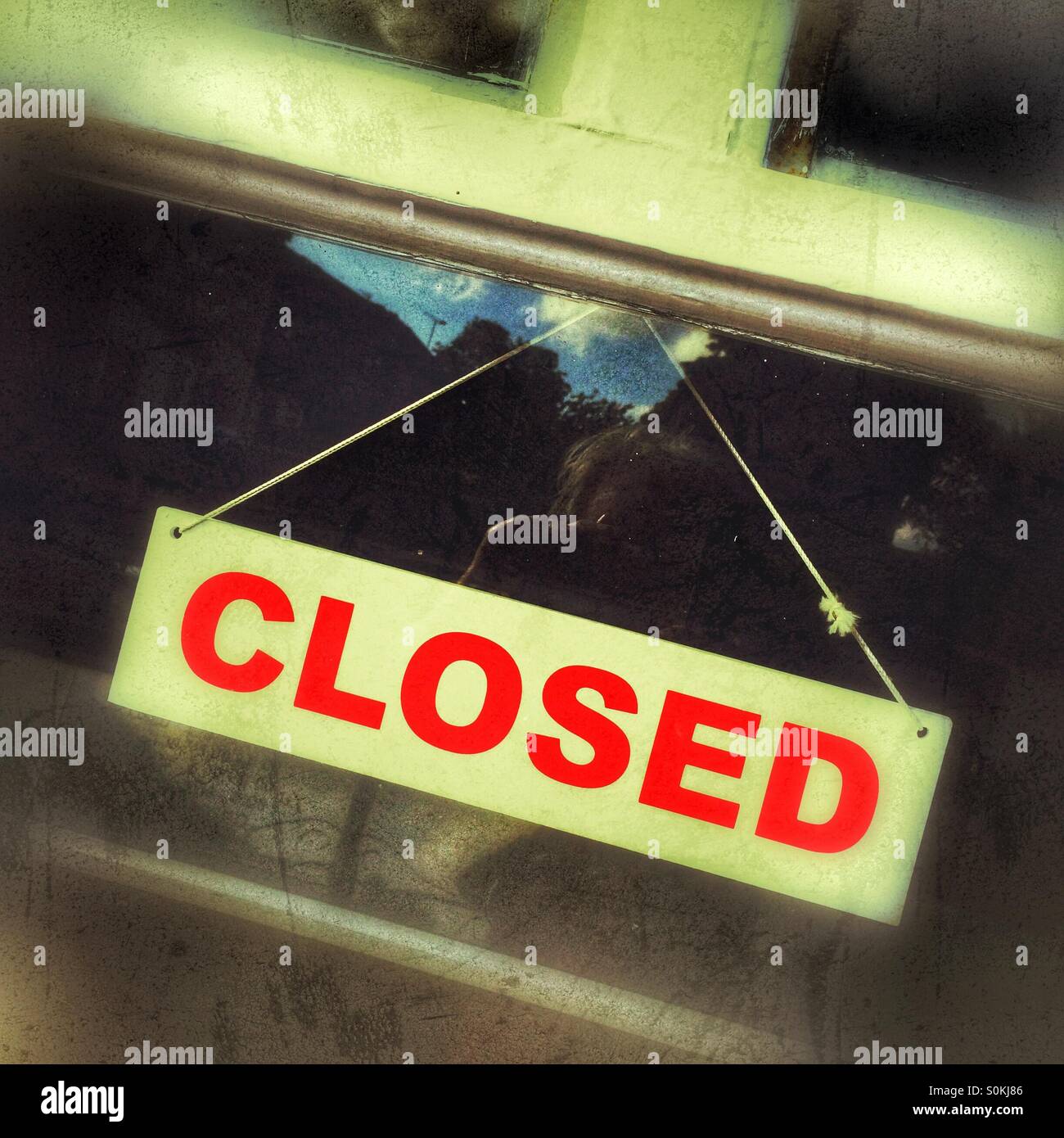 Closed sign on window - Smartphone Captured Stock Image