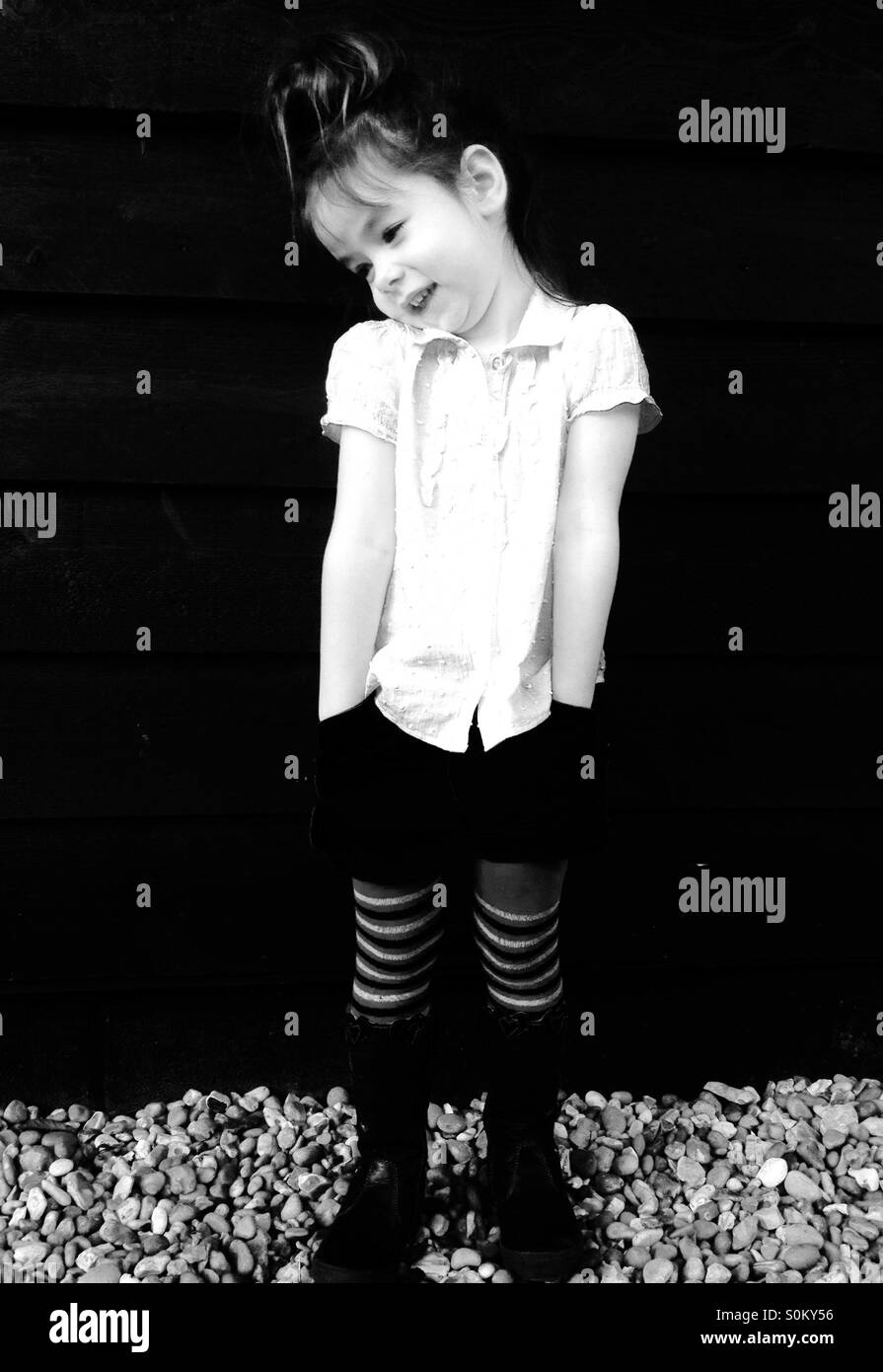 3-year old girl wearing new clothes Stock Photo