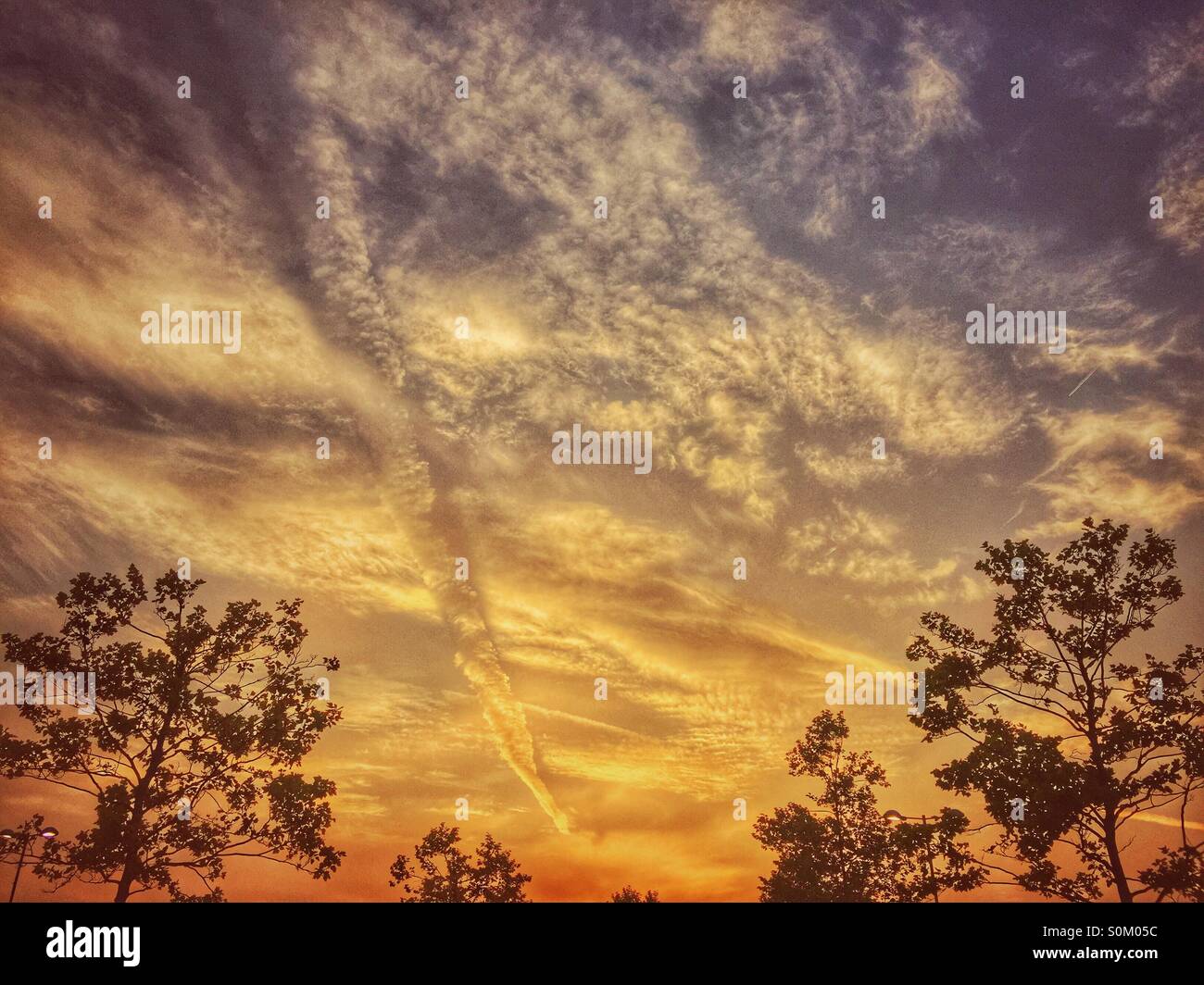 Dramatic clouds at sunrise Manchester UK - Smartphone Captured Stock Image