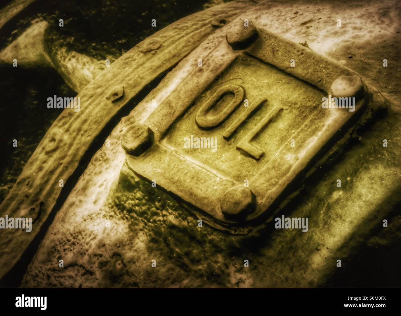 oil sign on machine - Smartphone Captured Stock Image
