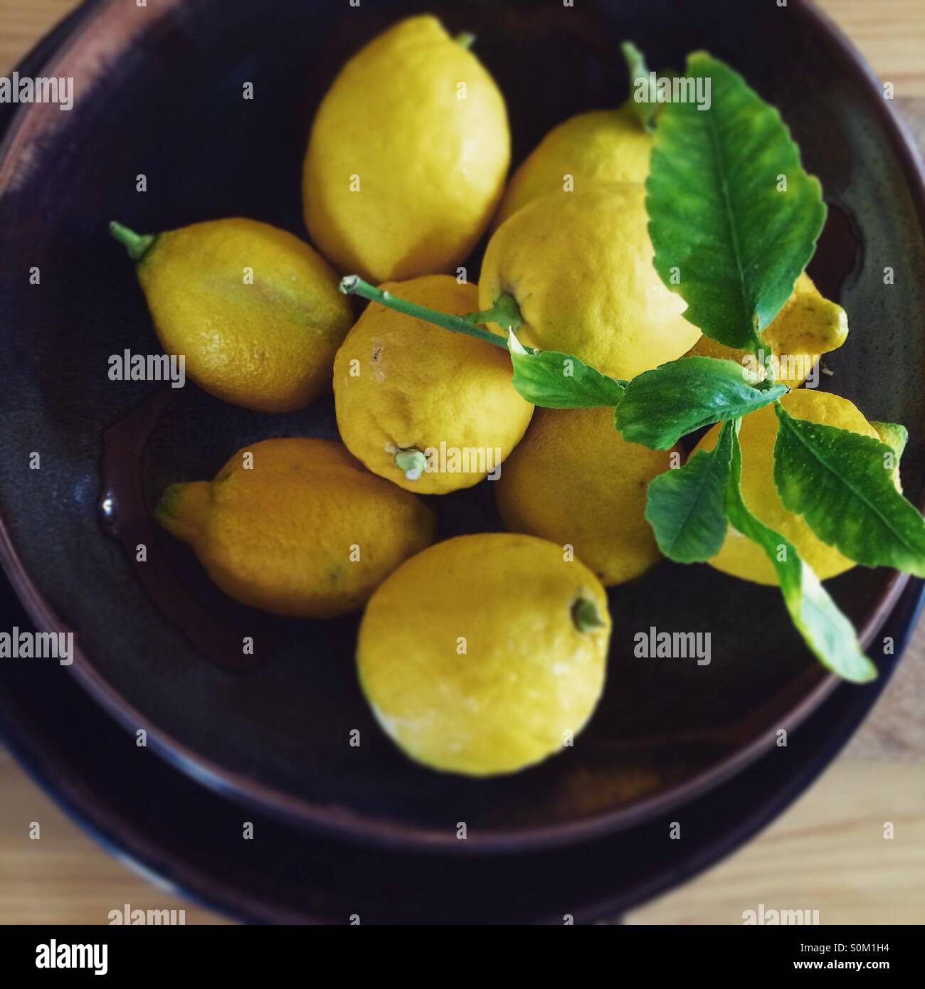 Bowl of lemons Stock Photo Alamy
