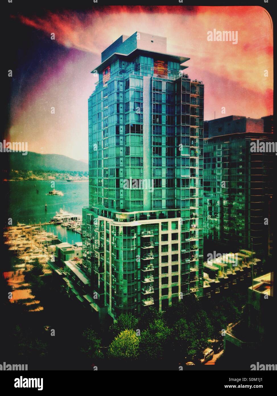 View of Coal Harbour and Vancouver apartments in Canada - Smartphone Captured Stock Image