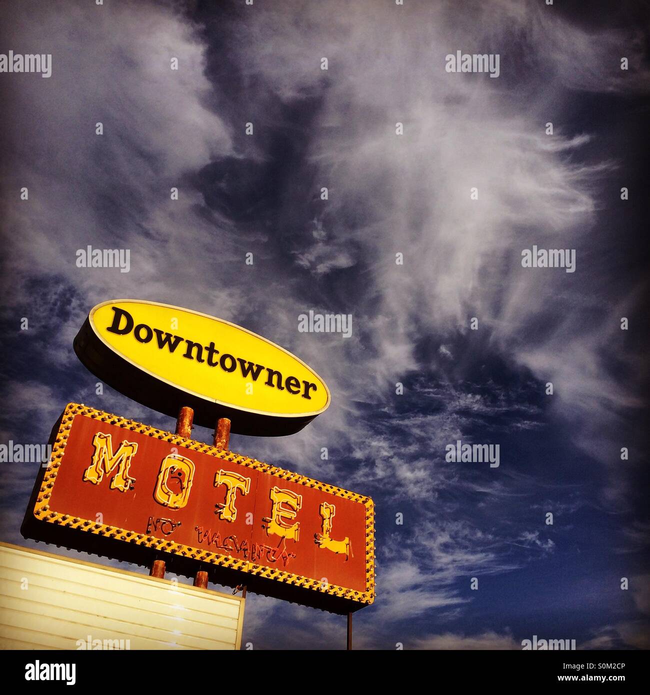 Downtowner Motel, sign and crazy sky, Houghton, Michigan Stock Photo