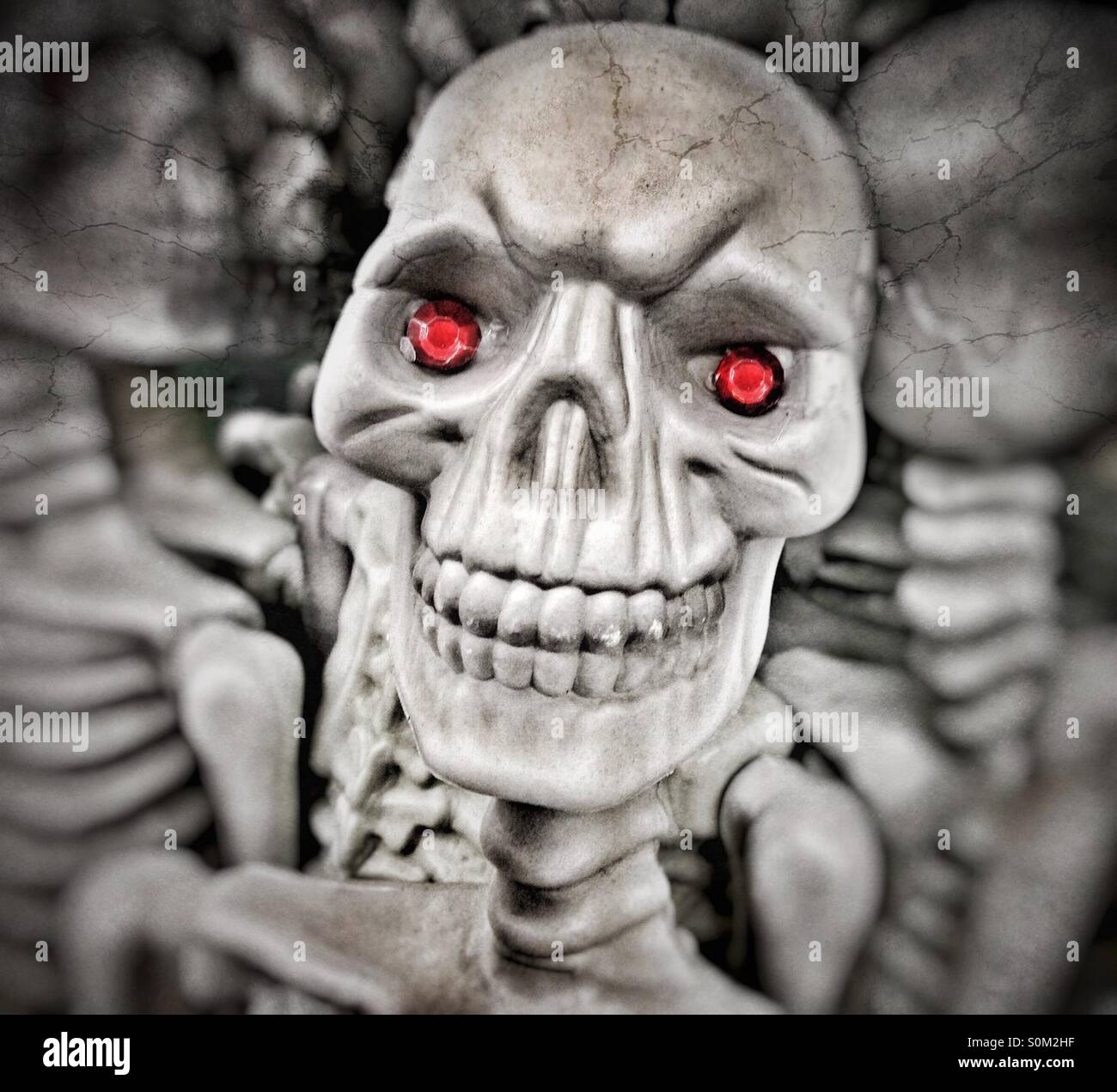 Scary Skeleton With Red Eyes Stock Photo - Alamy
