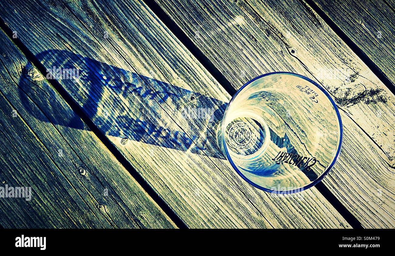 Thatchers cider glass with shadow reflection of name - Smartphone Captured Stock Image