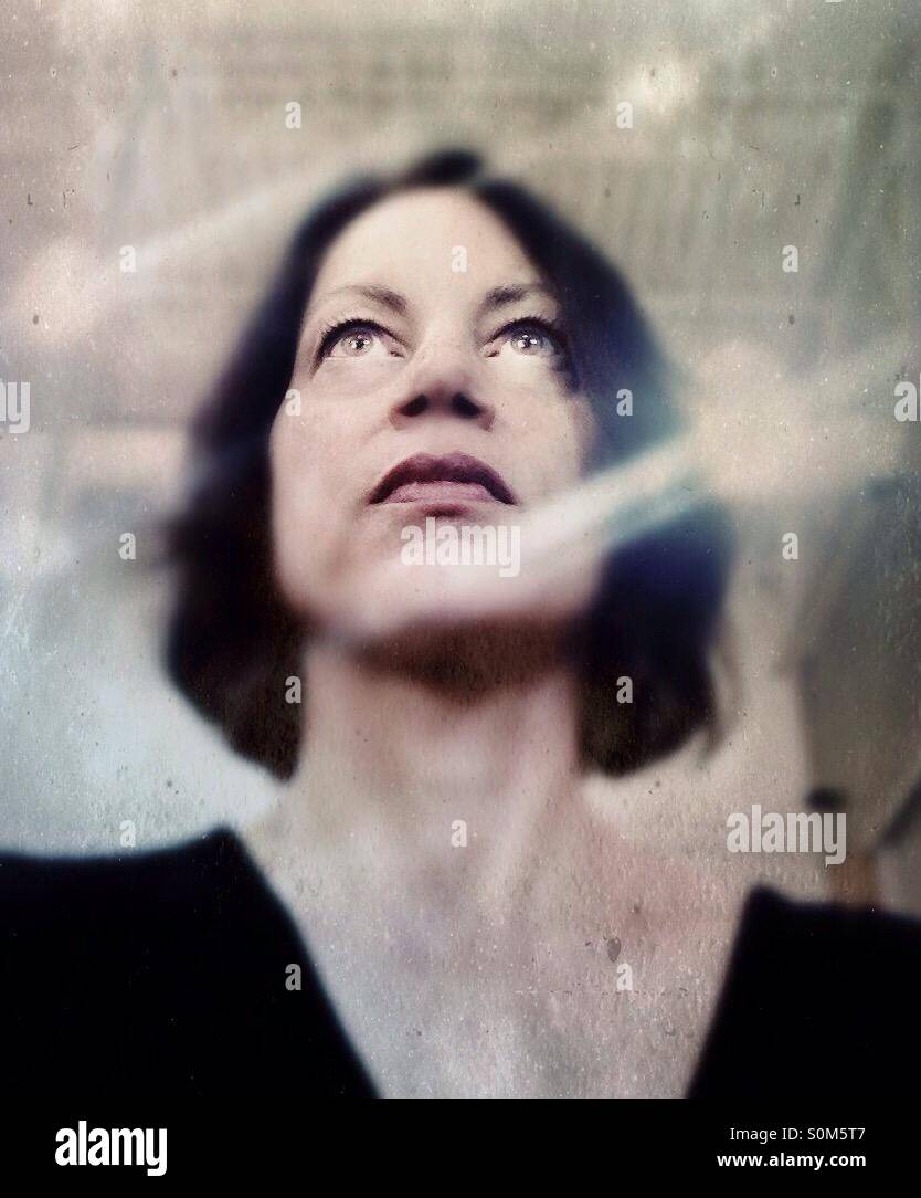 Woman looking up - Smartphone Captured Stock Image