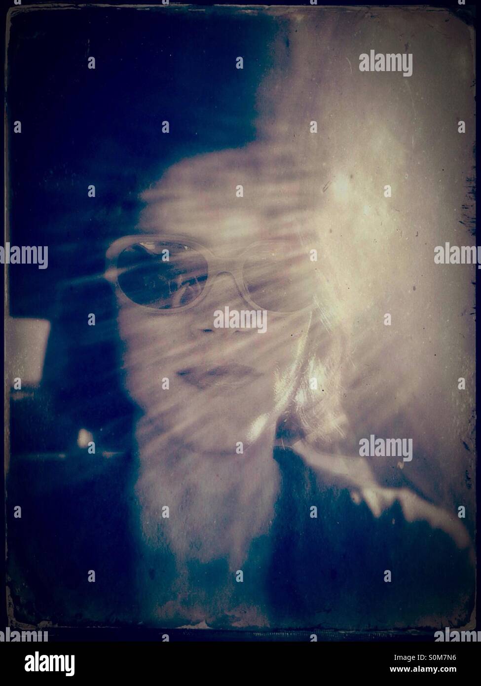 Portrait of woman with sunbeams - Smartphone Captured Stock Image