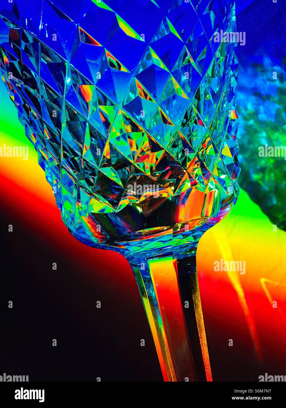 Crystal stemware in prism spectrum of colors - Smartphone Captured Stock Image