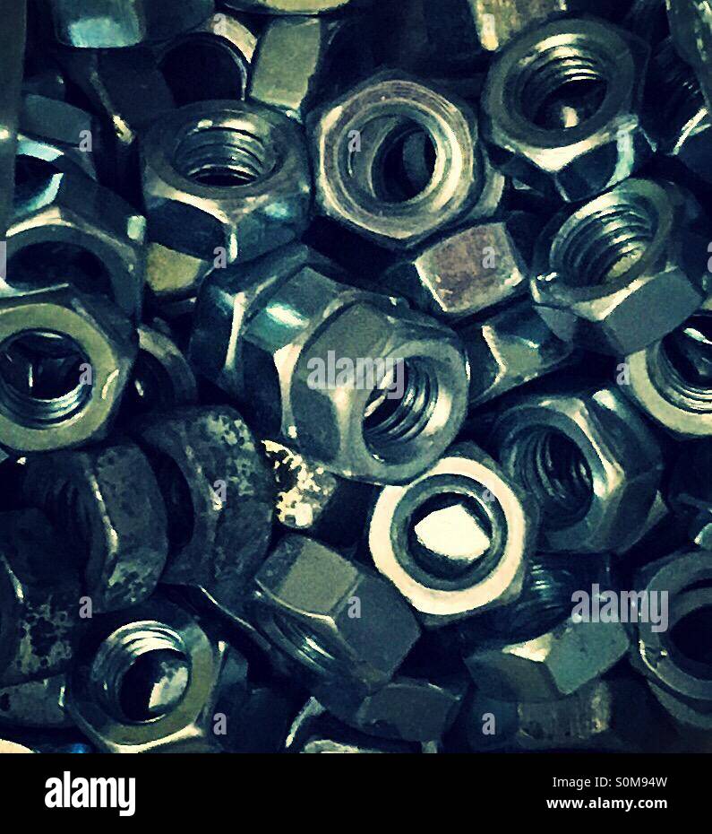 Collection of metal nuts without the bolts - Smartphone Captured Stock Image