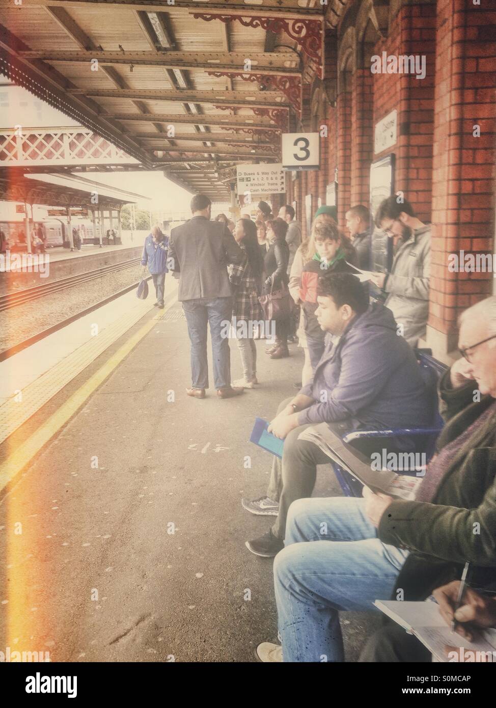 Waiting for a train. - Smartphone Captured Stock Image