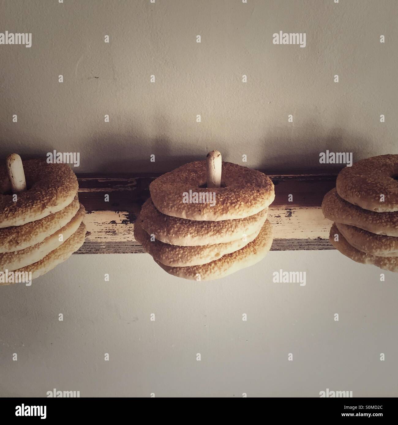 Bagels on a coat hook Stock Photo