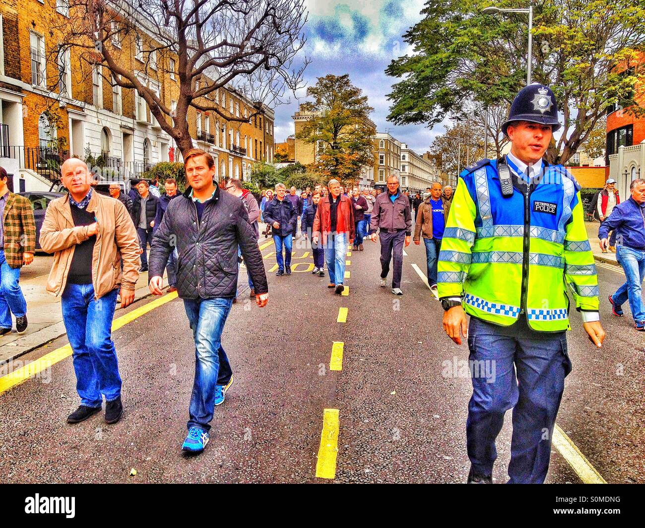 Chelsea fans on the way to the match. - Smartphone Captured Stock Image