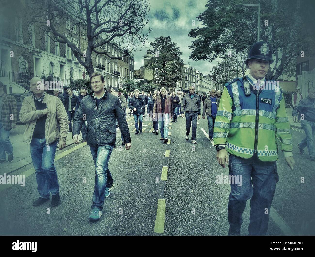 Chelsea fans on their way to the match. - Smartphone Captured Stock Image