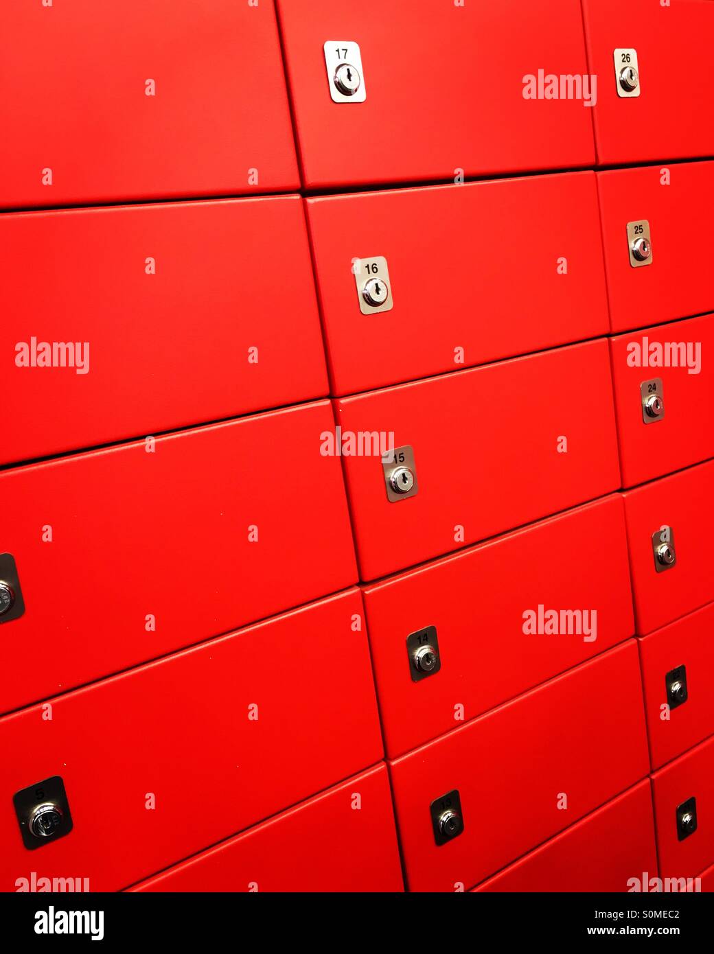 Numbered red safety deposit boxes. - Smartphone Captured Stock Image