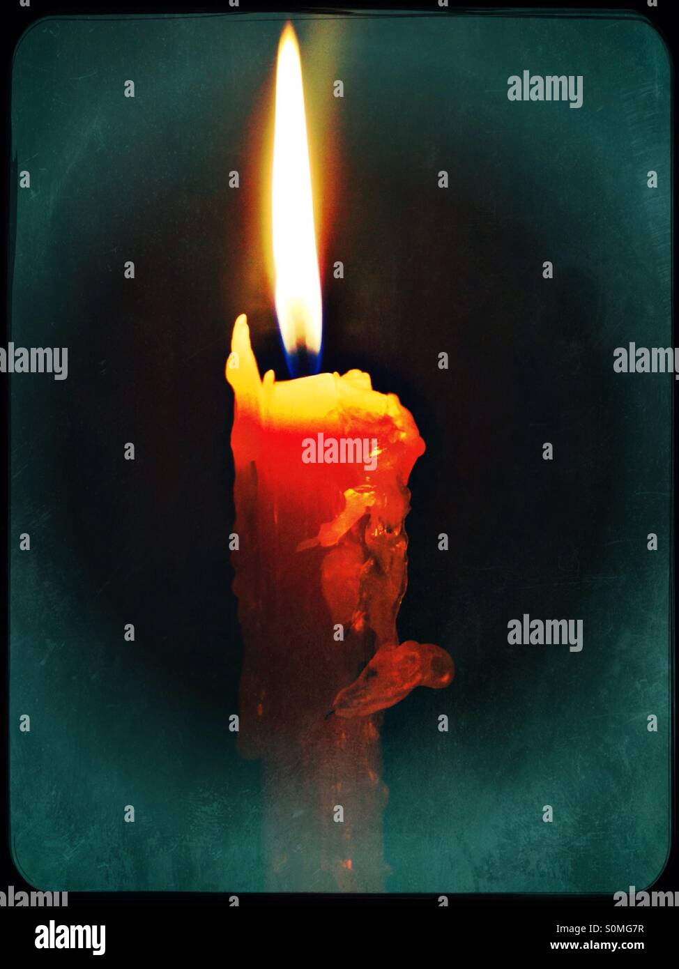 Candle burning single flame - Smartphone Captured Stock Image