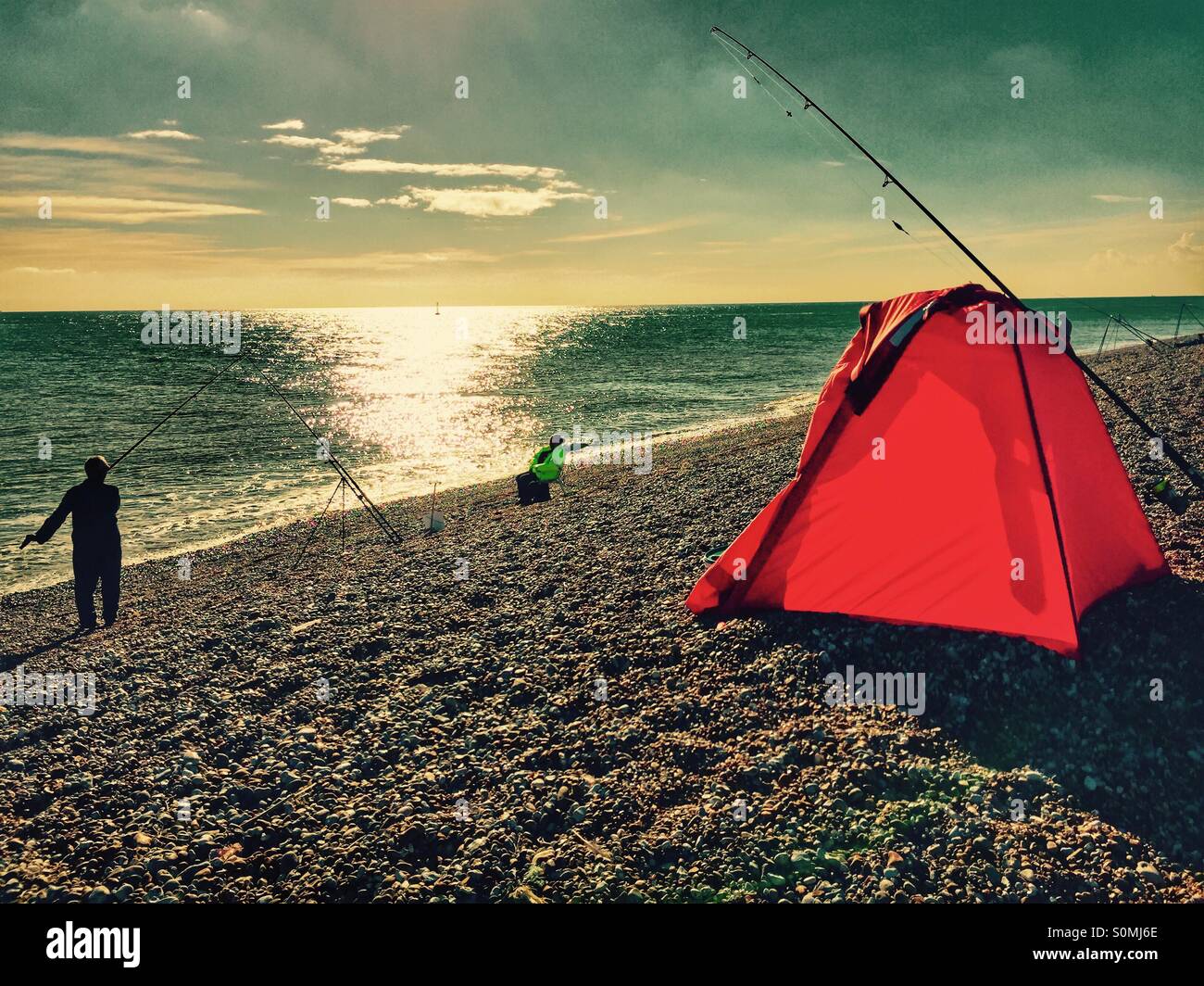 Beach fishermen, fishing for cod in the deep water off Dungeness ...