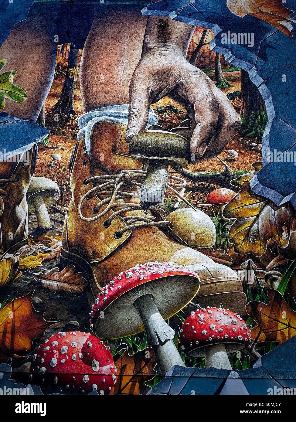 Small detail from street wall art, Glasgow, showing mushroom picking - Smartphone Captured Stock Image