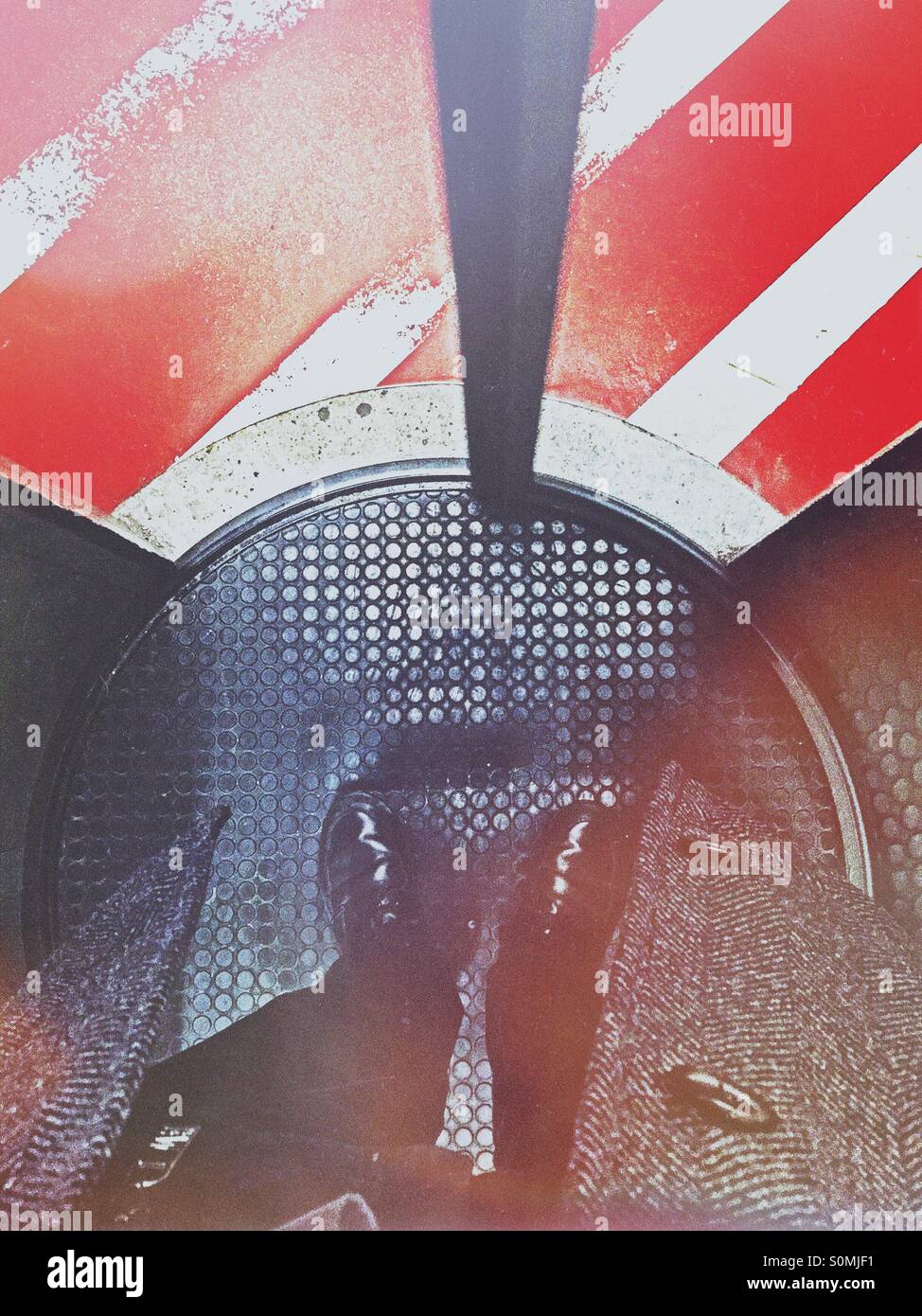 Business man standing in a circle lock access control gate. - Smartphone Captured Stock Image