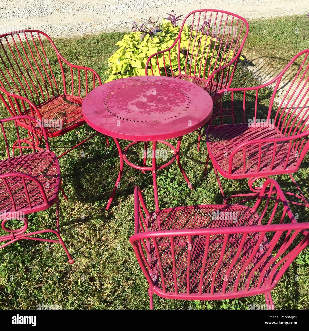Red patio set Stock Photo Alamy