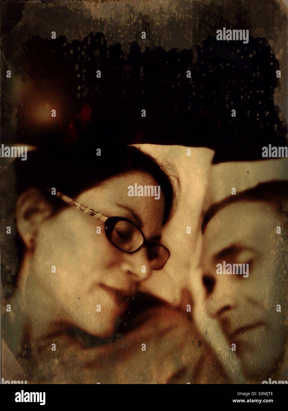 Couple sleeping in bed - Smartphone Captured Stock Image