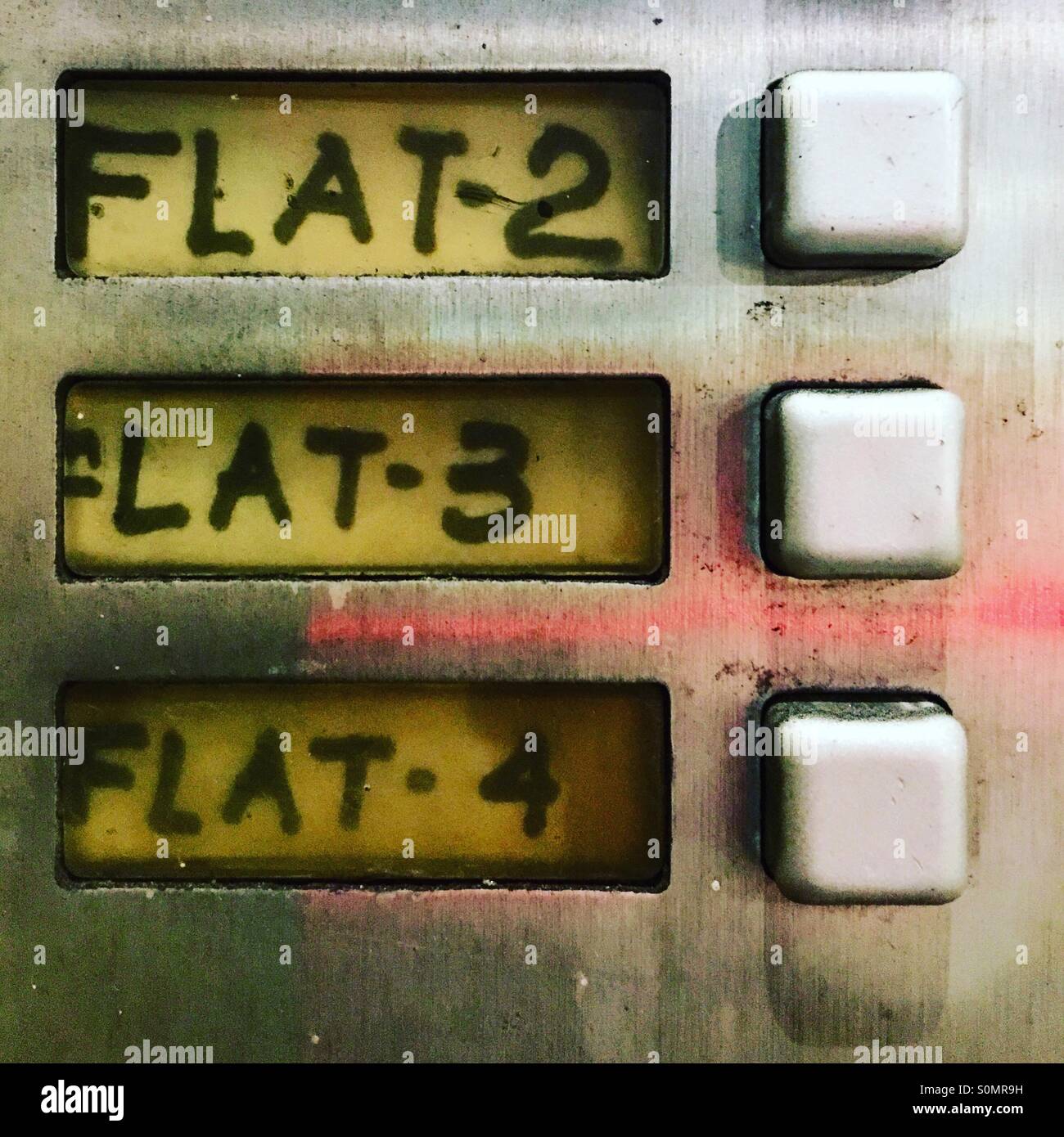 Buzzers for flats at entrance door. - Smartphone Captured Stock Image