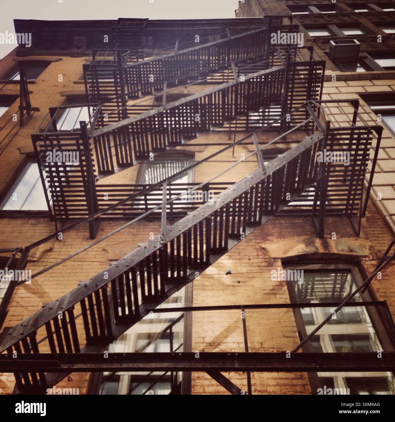 Metal fire escape stairs, Manhattan, New York City, United States of America. - Smartphone Captured Stock Image