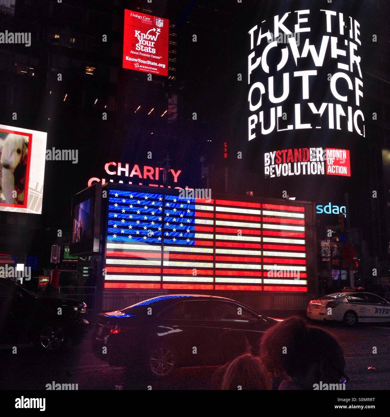 Neon American flag at the US military recruiting station, Times Square, Manhattan, New York City, United States of America. - Smartphone Captured Stock Image