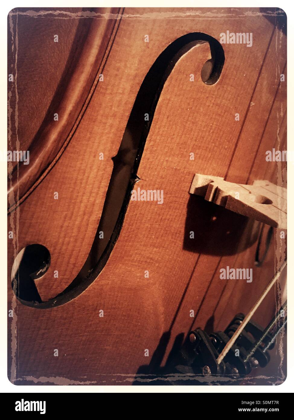 Up of base of a violin body and F hole Stock Photo Alamy